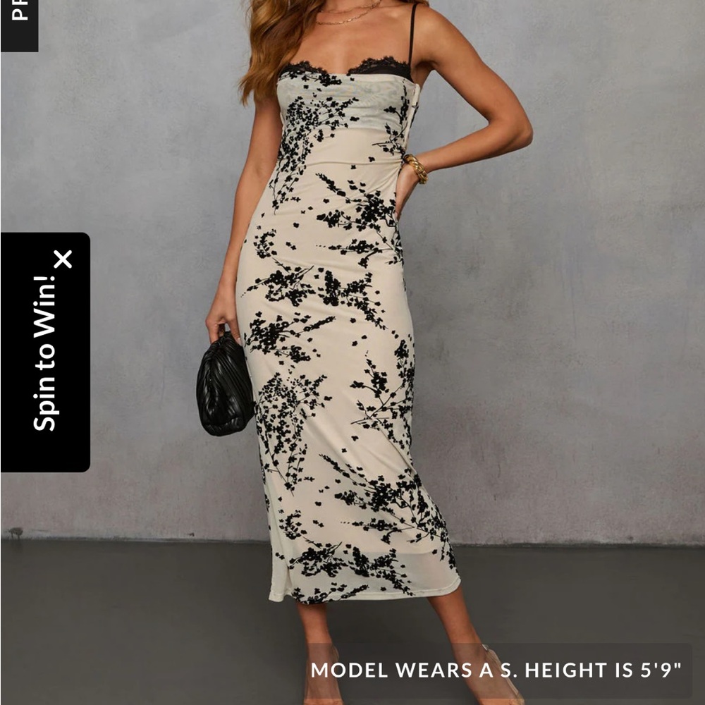 Elegant Black and Cream Floral Dress